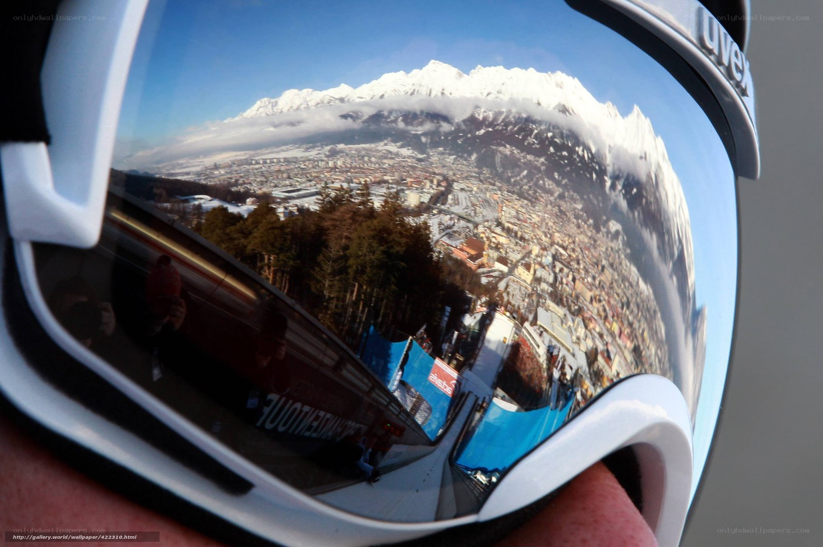 goggles reflect mountain town