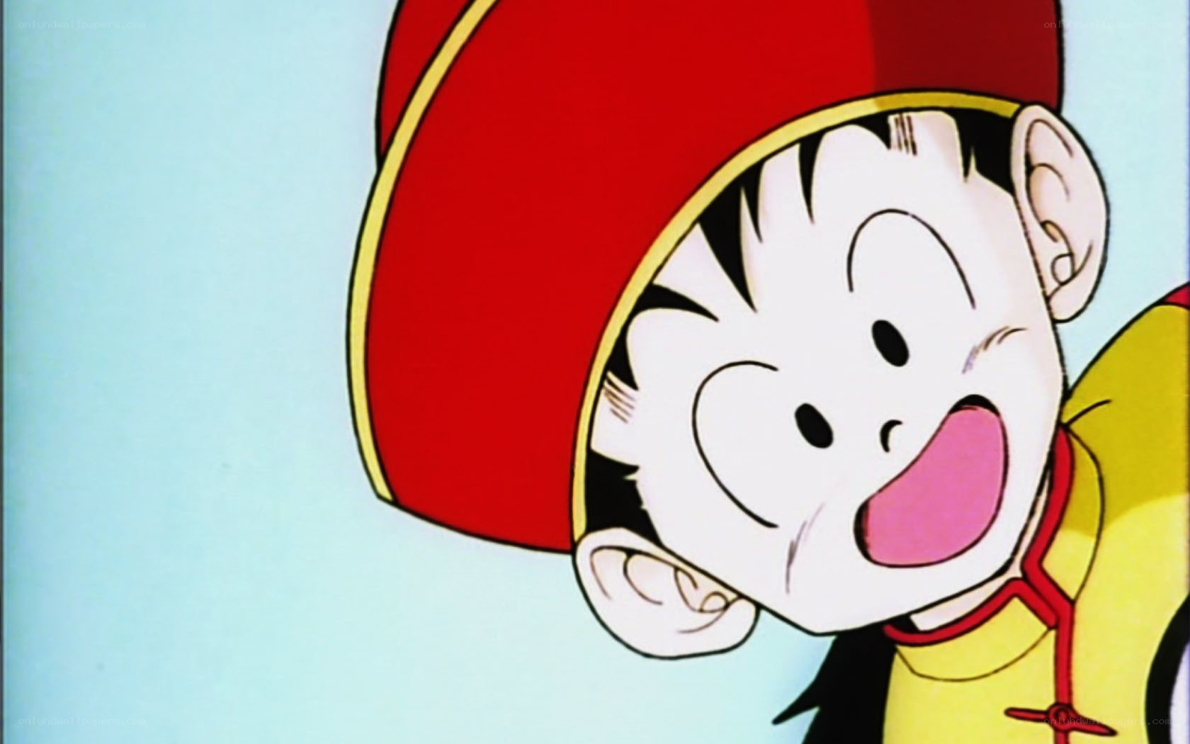 Goku as a child laughing