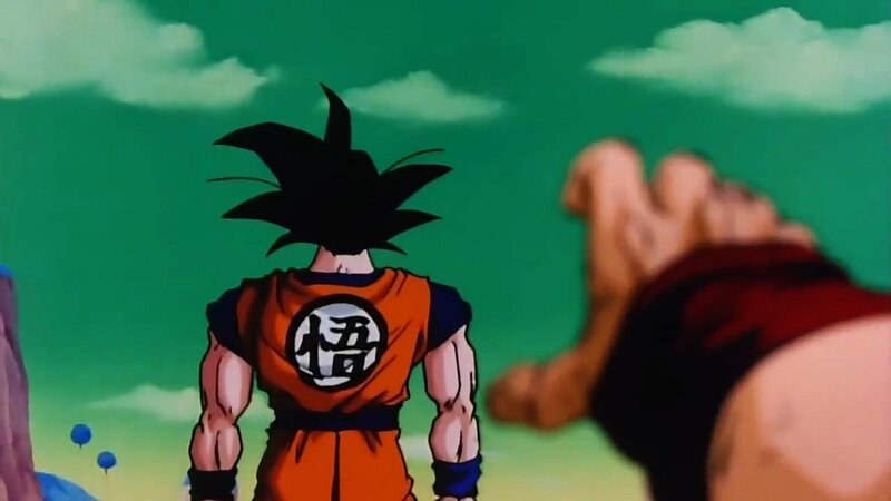 Goku facing an opponent