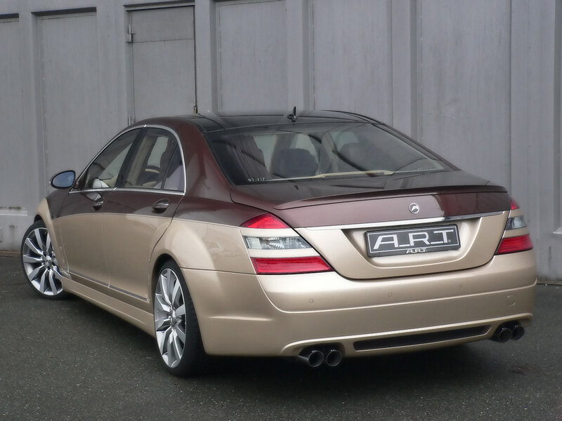 gold and brown luxury sedan