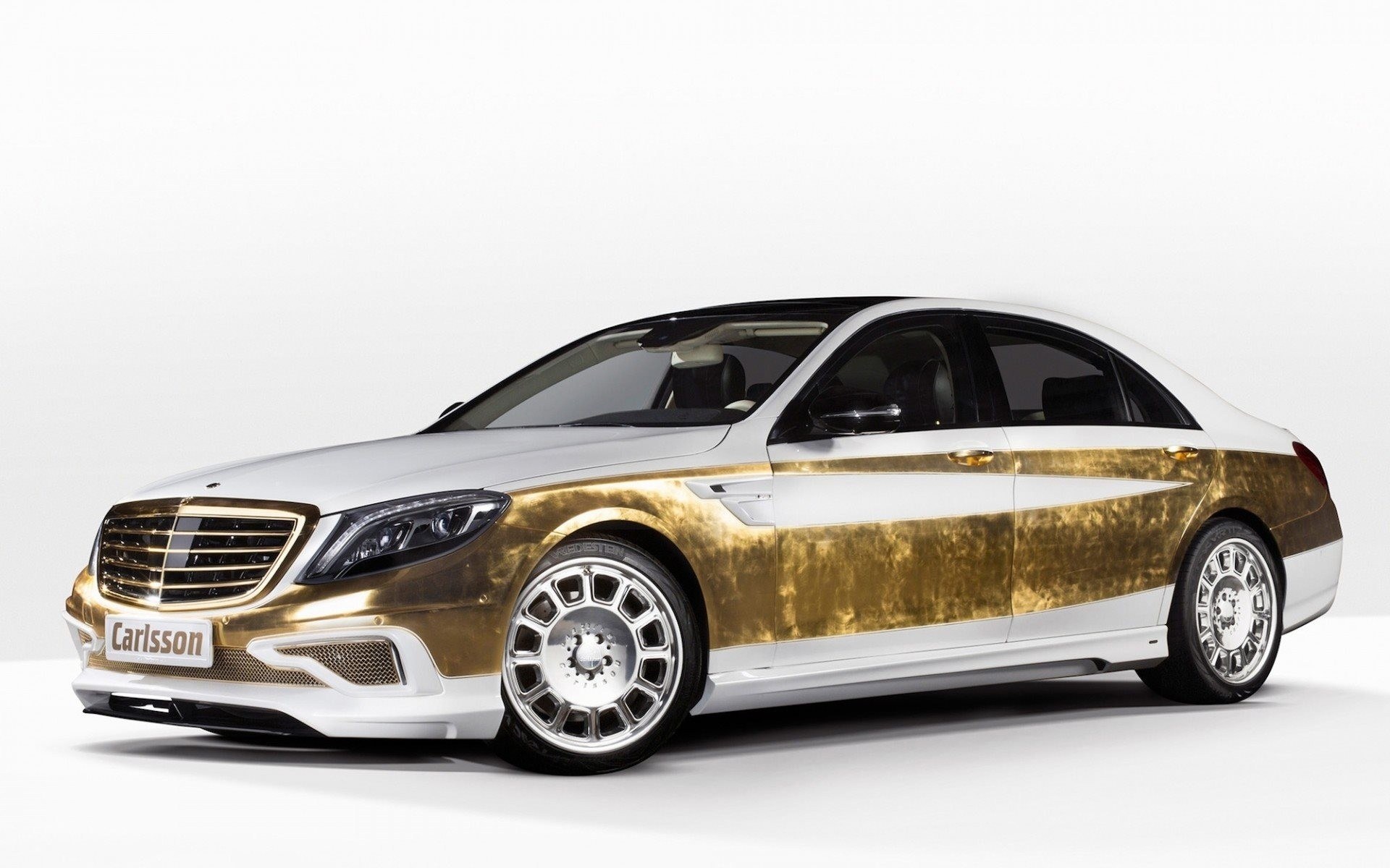 Gold and white luxury sedan