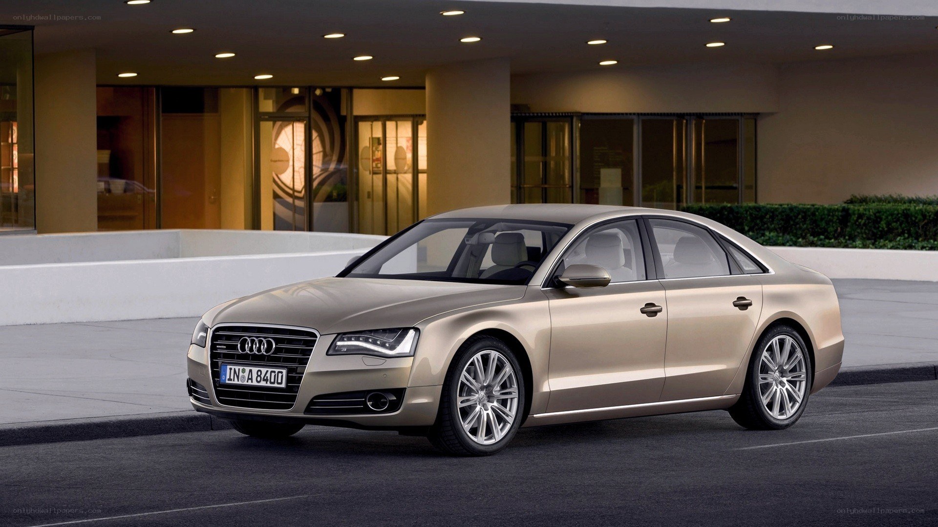 Gold Audi A8 sedan
