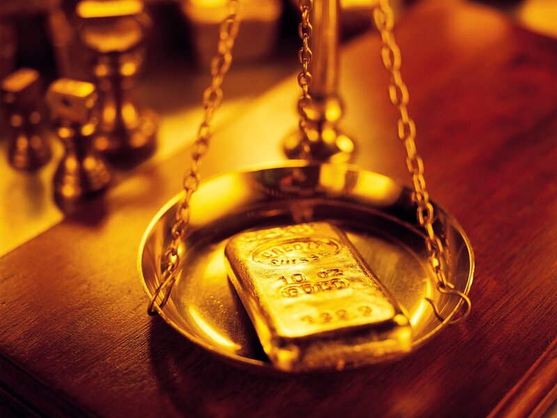 Gold bar on scale