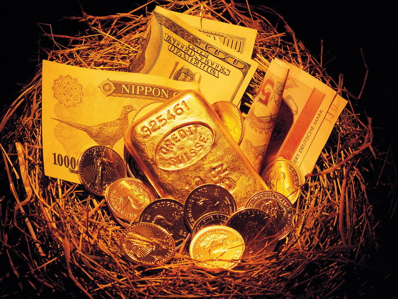 Gold bars and currency in a nest
