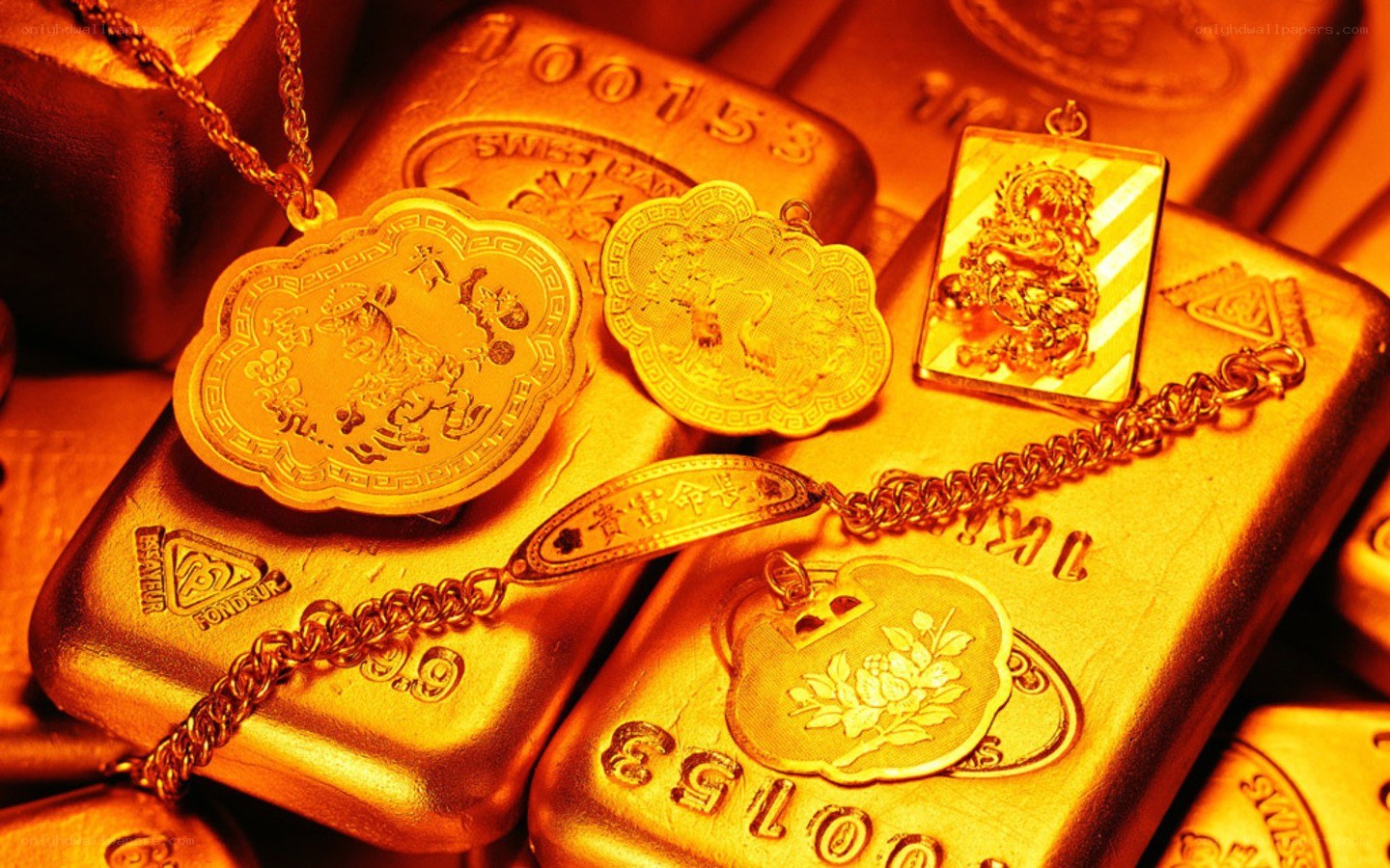 gold bars and jewelry