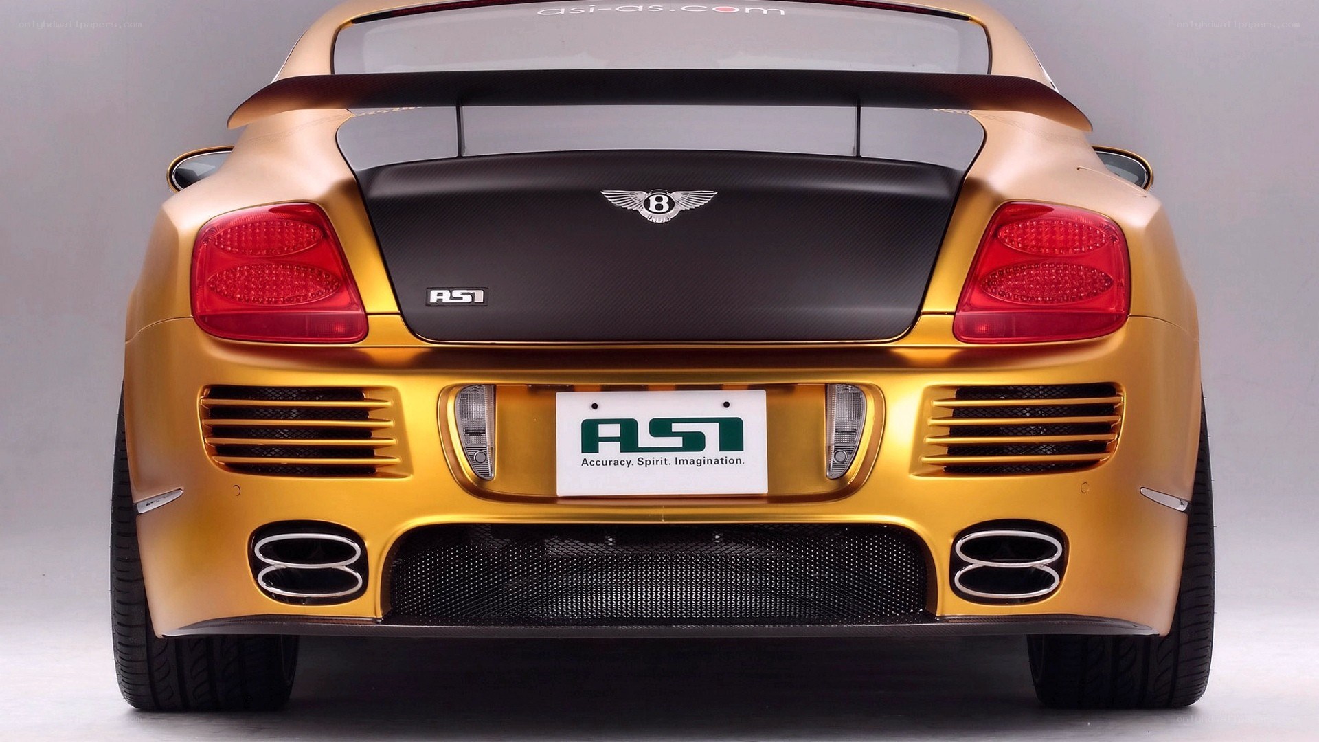 gold bentley rear view