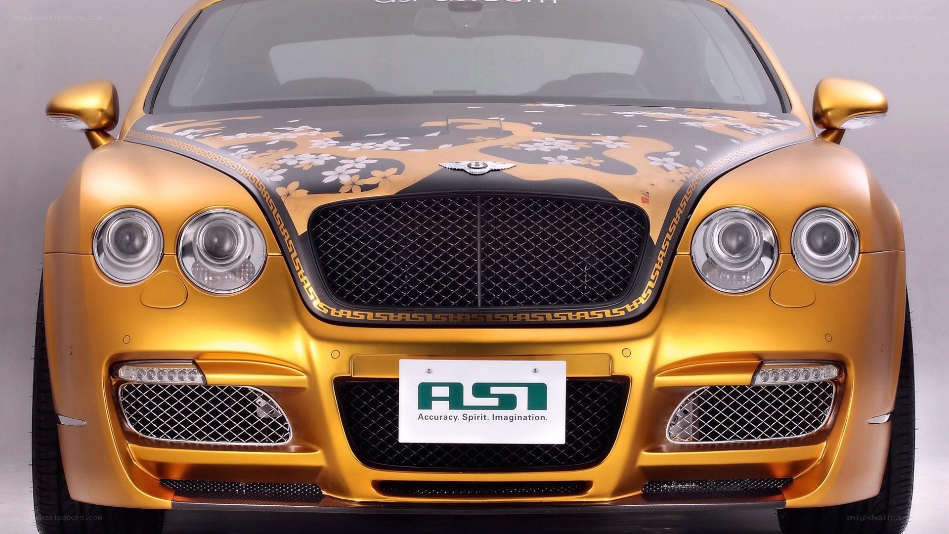 gold bentley with custom graphics