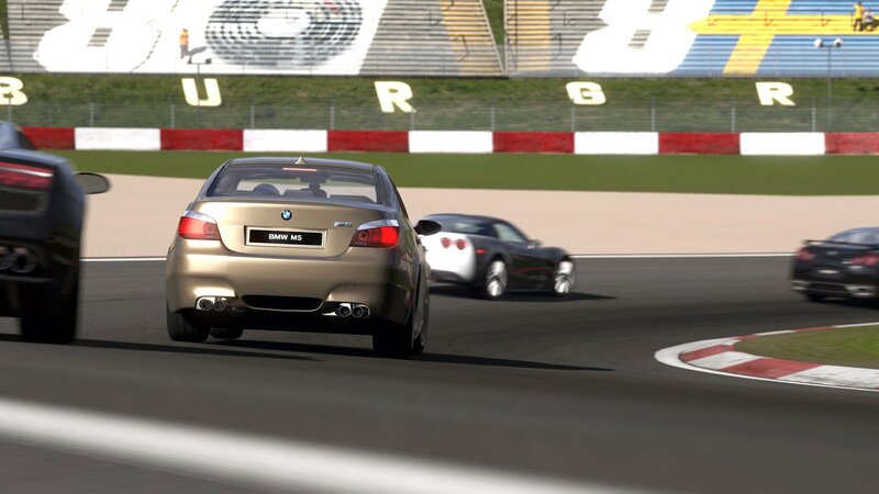 Gold BMW M5 on Track