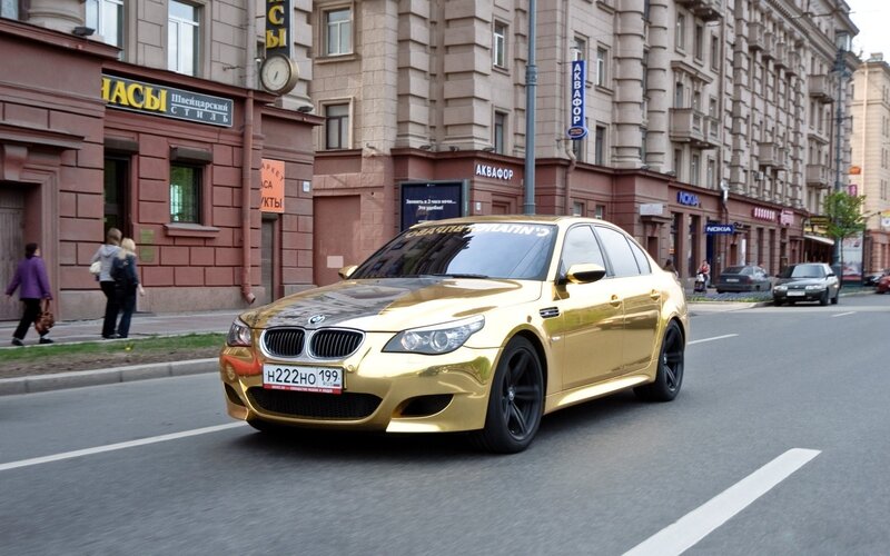 Gold BMW M5 Sedan