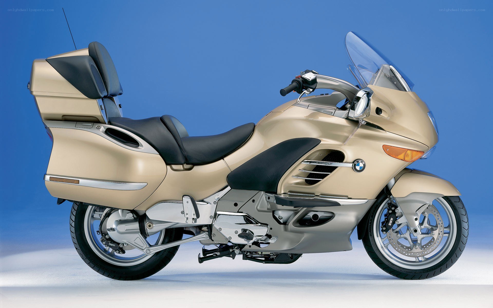 gold BMW touring motorcycle