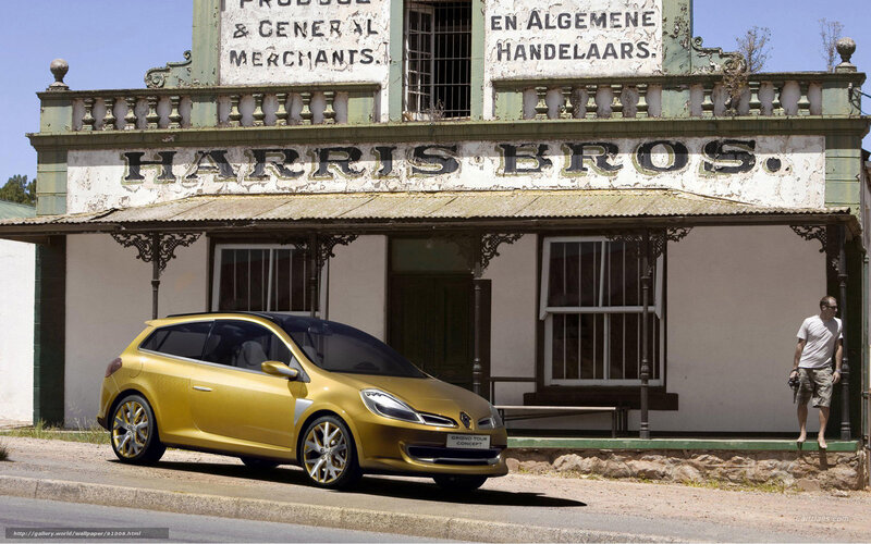 Gold car in front of old building
