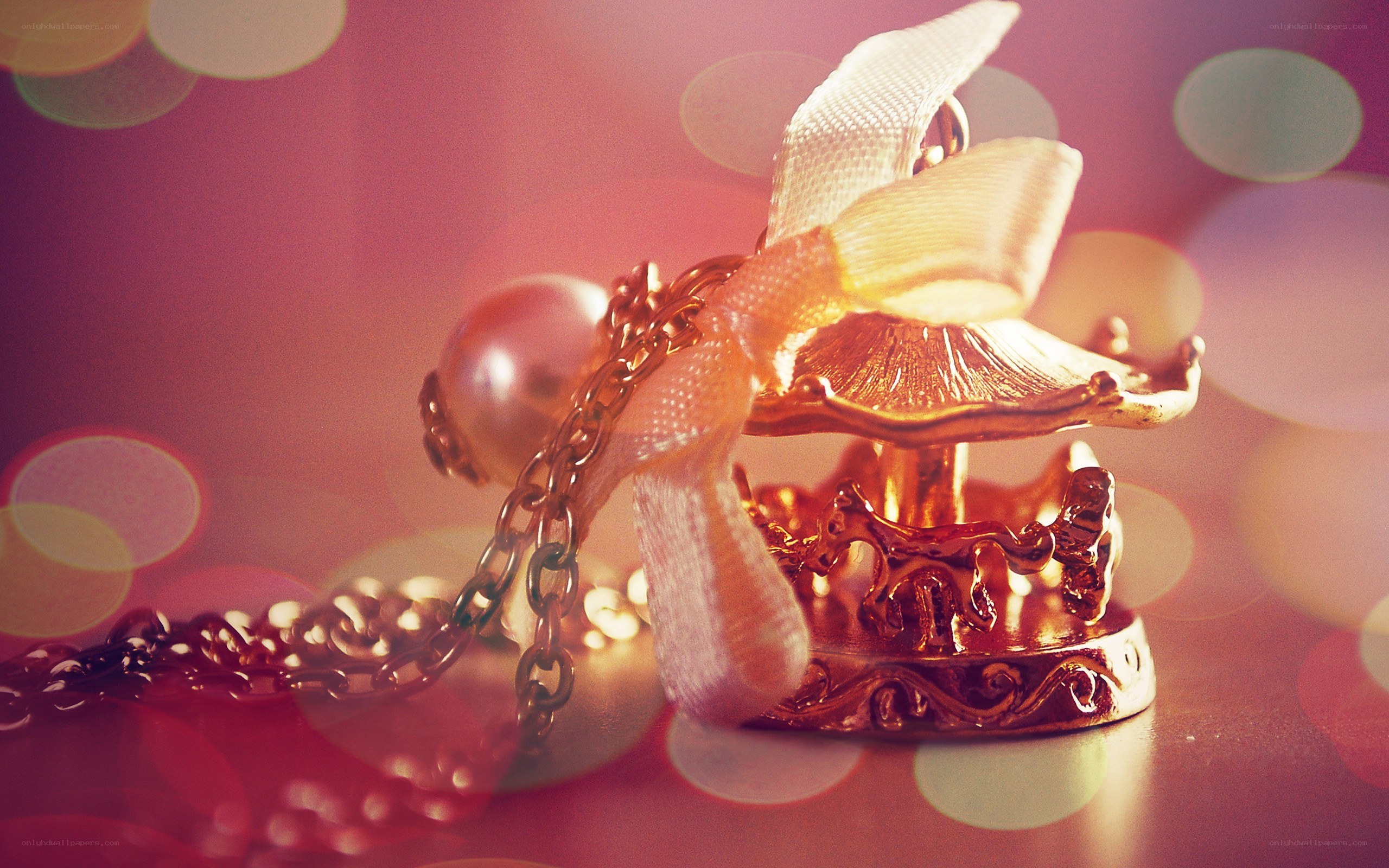 gold carousel necklace with pearl