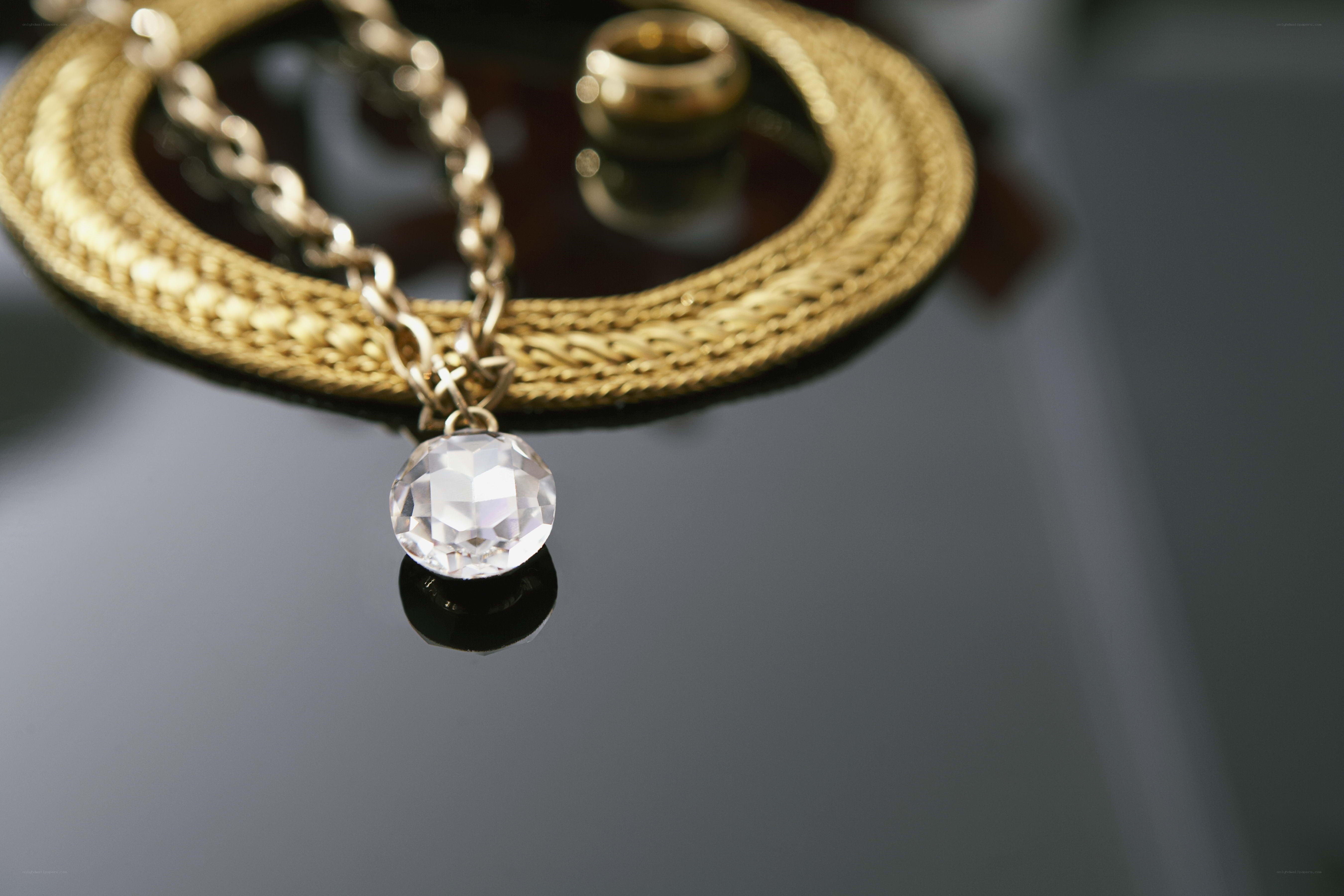 gold chain with crystal pendant