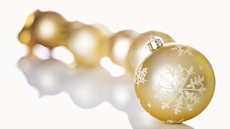 Gold Christmas ornaments with snowflakes