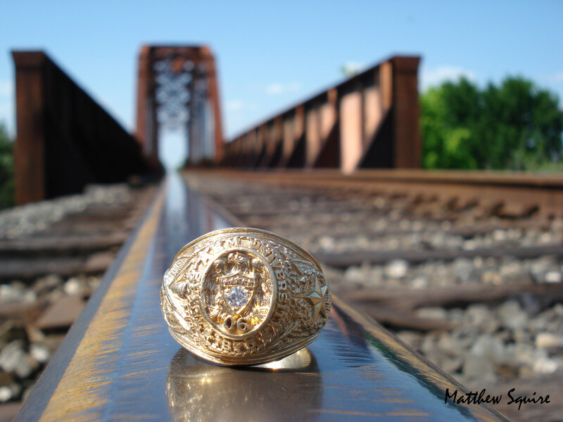 Gold Class Ring on Rail