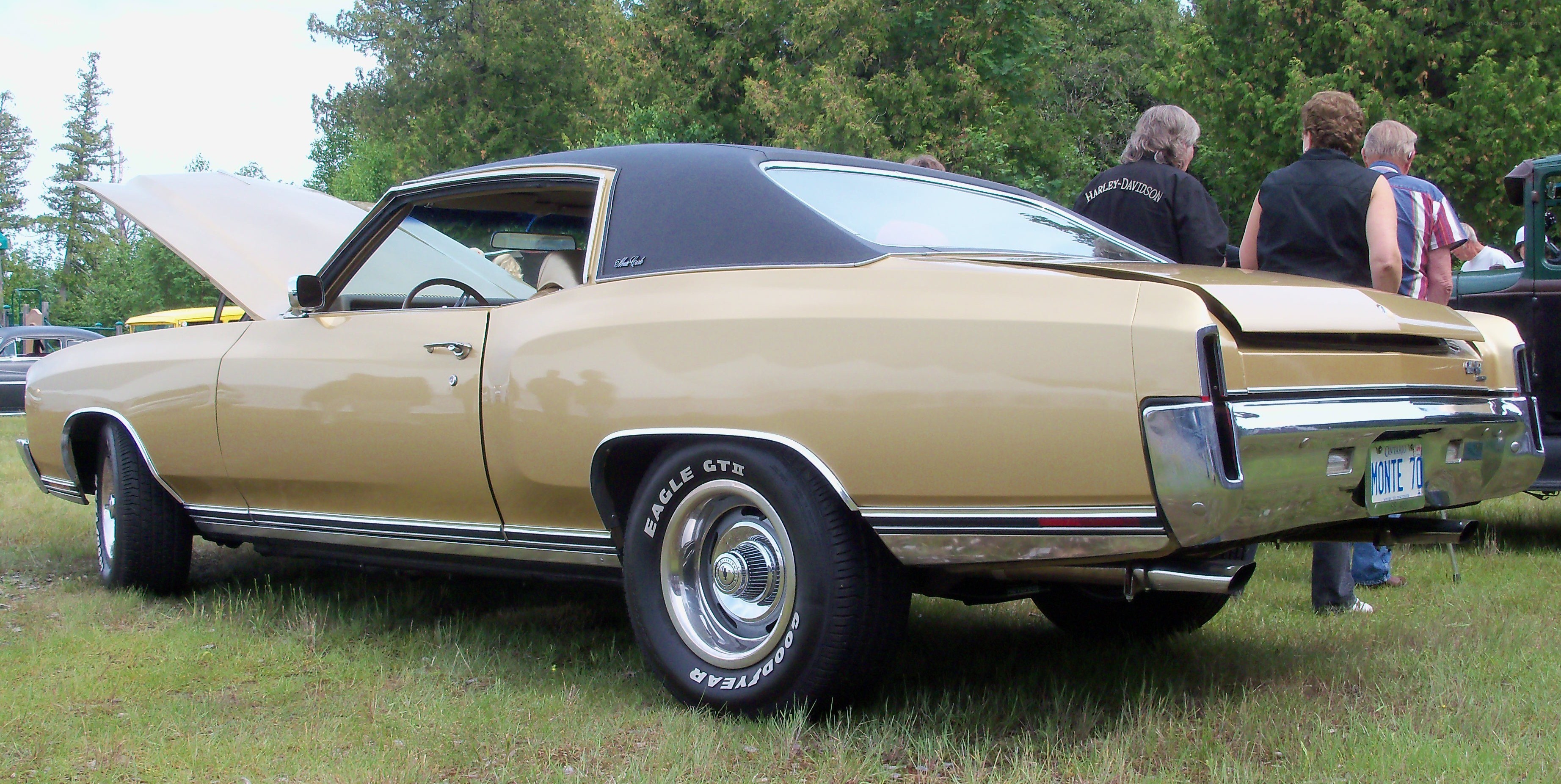 gold classic car at show