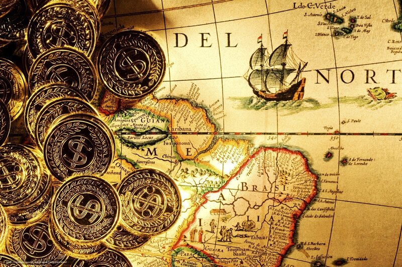 Gold Coins on Map — Dramatic