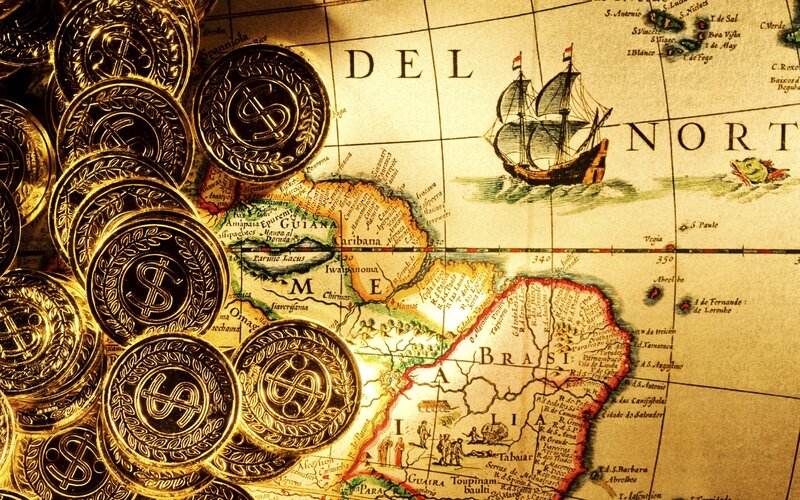 gold coins on old map