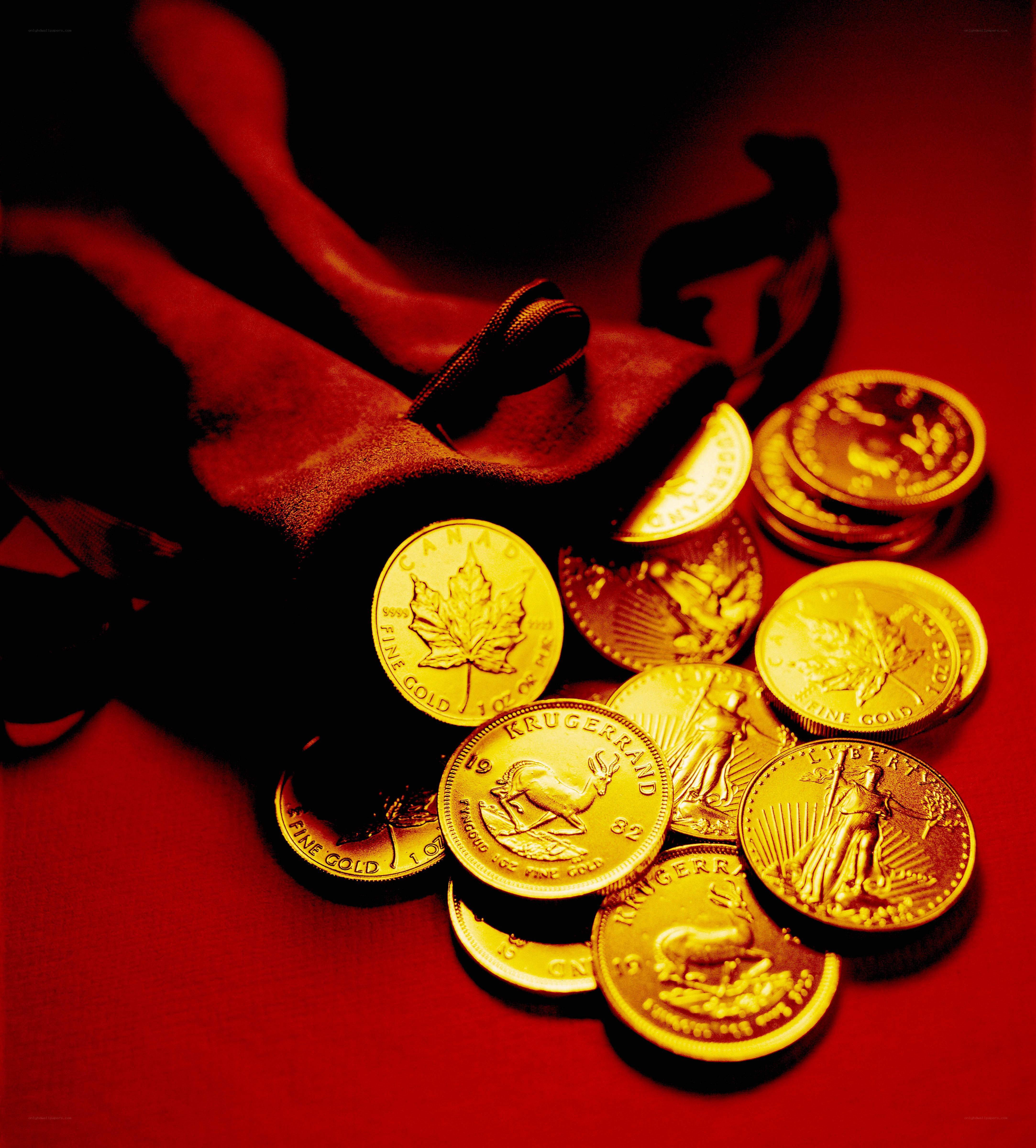 Gold coins on red cloth