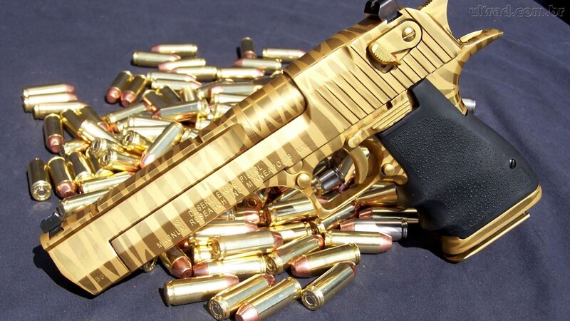 Gold-colored Pistol with Bullets — Gold, Dramatic