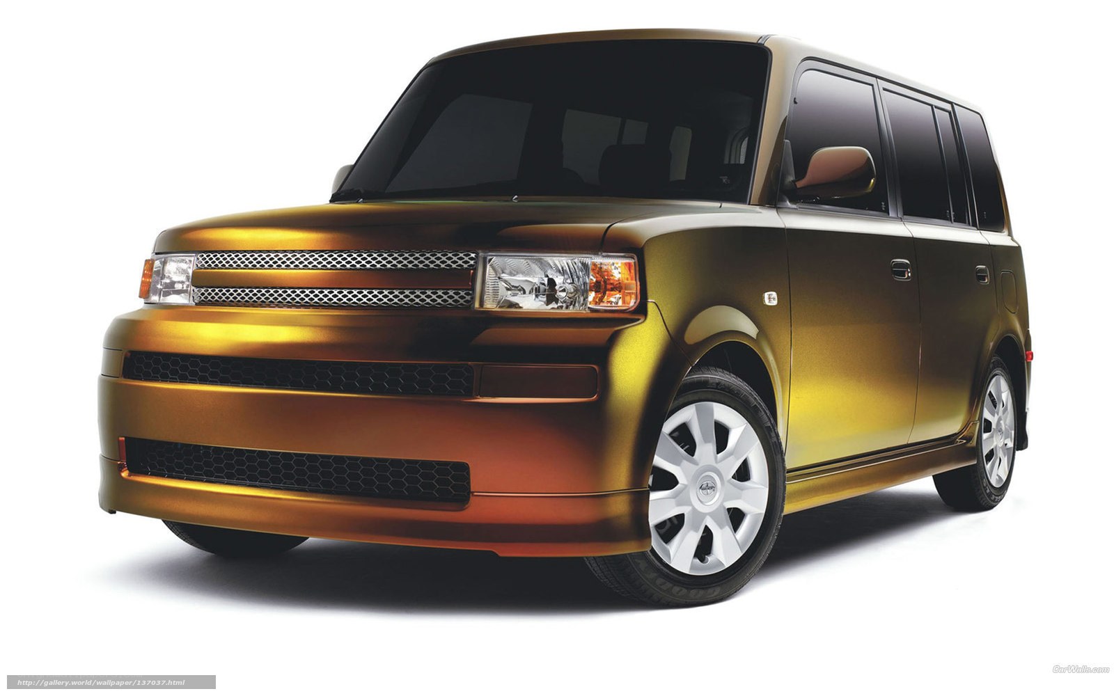 gold-colored Scion xB car