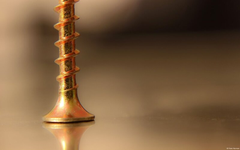 Gold-colored Screw