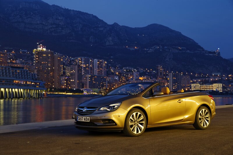 Gold convertible car at dusk