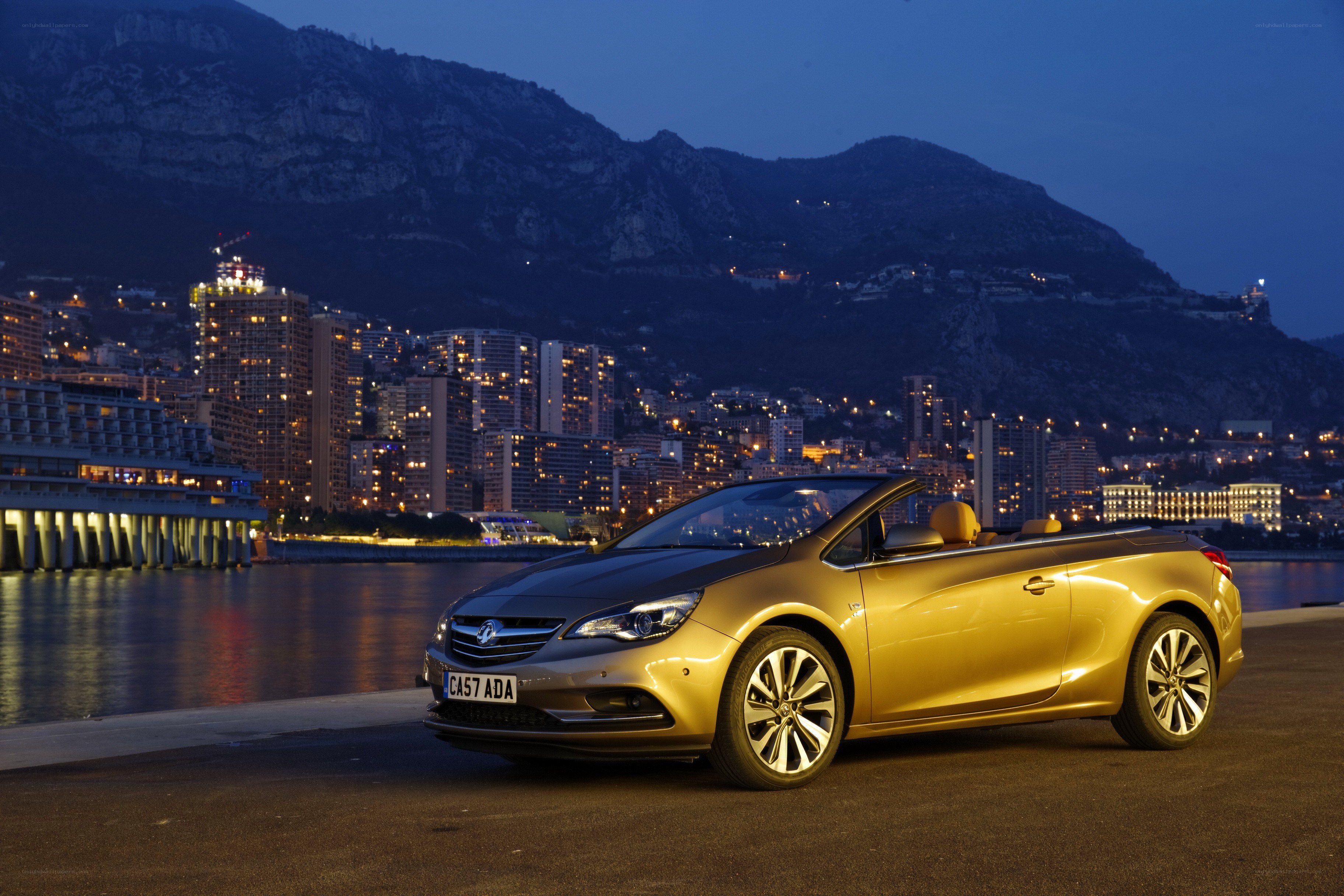 Gold convertible car at dusk