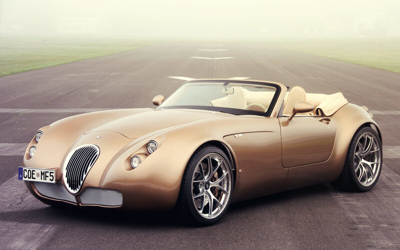Gold Convertible Sports Car — Serene