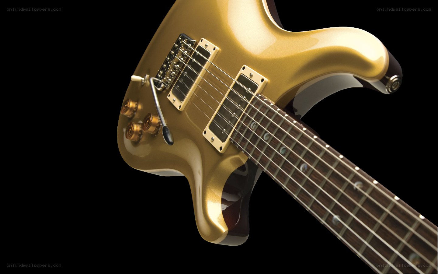 gold electric guitar close-up