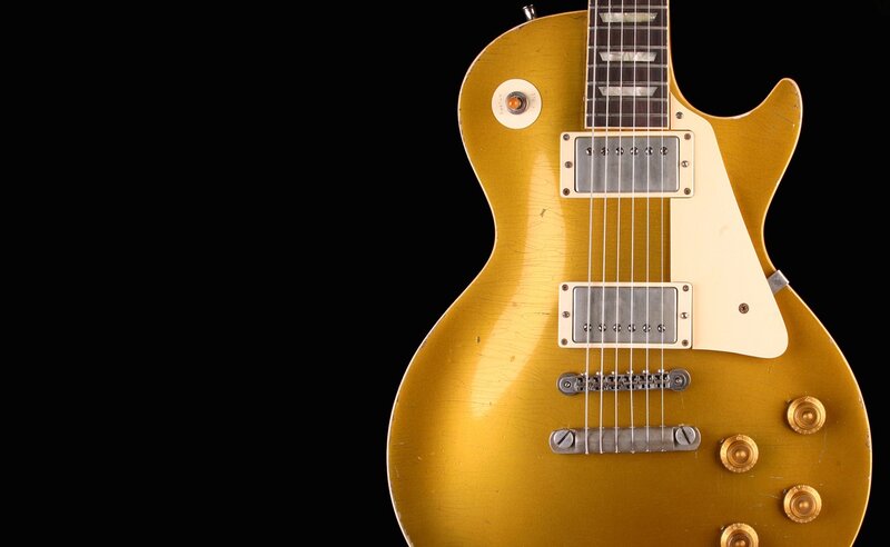 Gold Electric Guitar — Dramatic
