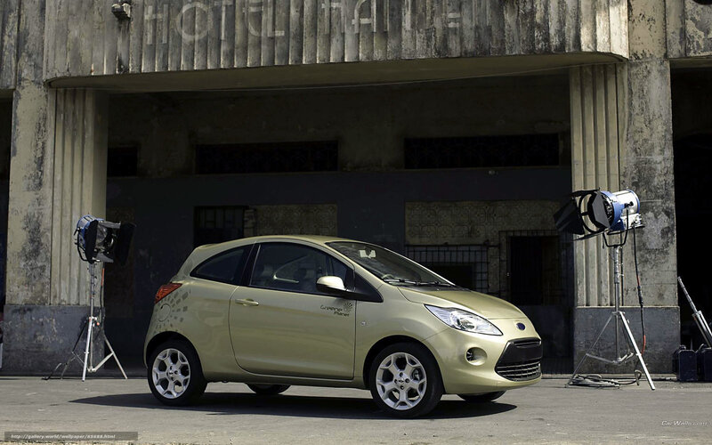 Gold Ford Ka in front of hotel