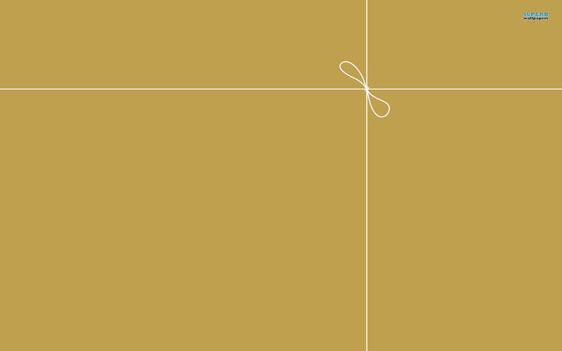 gold gift box with bow
