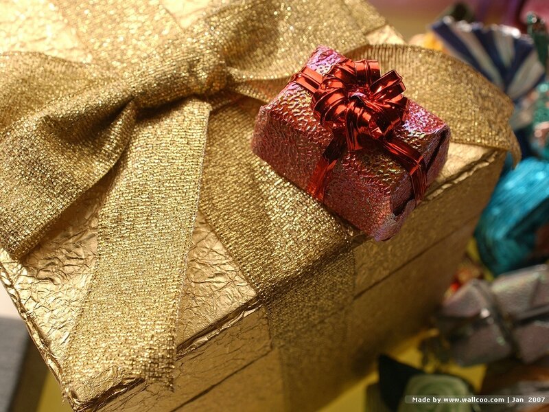 Gold Gift Box with Red Bow