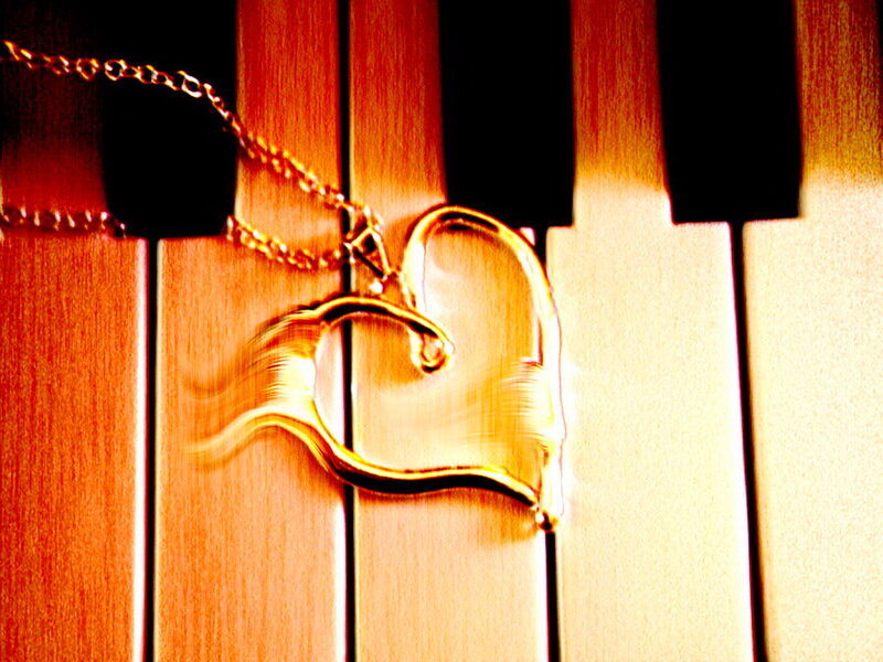 Gold Heart Pendant — Dramatic