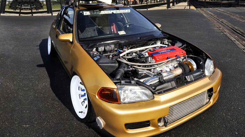 gold honda civic with modified engine
