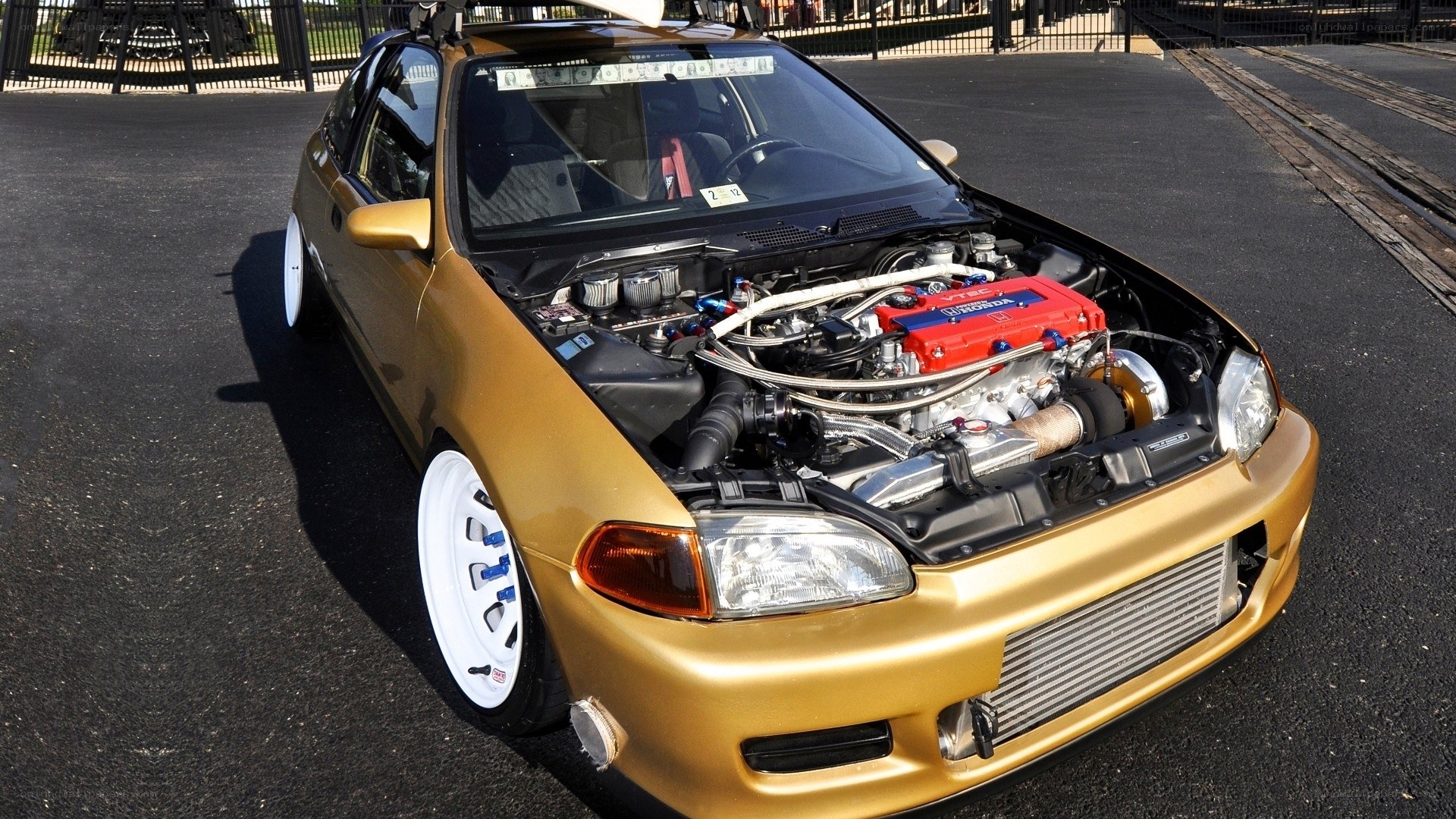 gold honda civic with modified engine