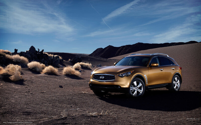 Gold Infiniti FX in desert