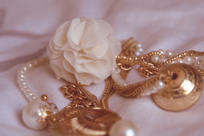 Gold Jewelry and Flower