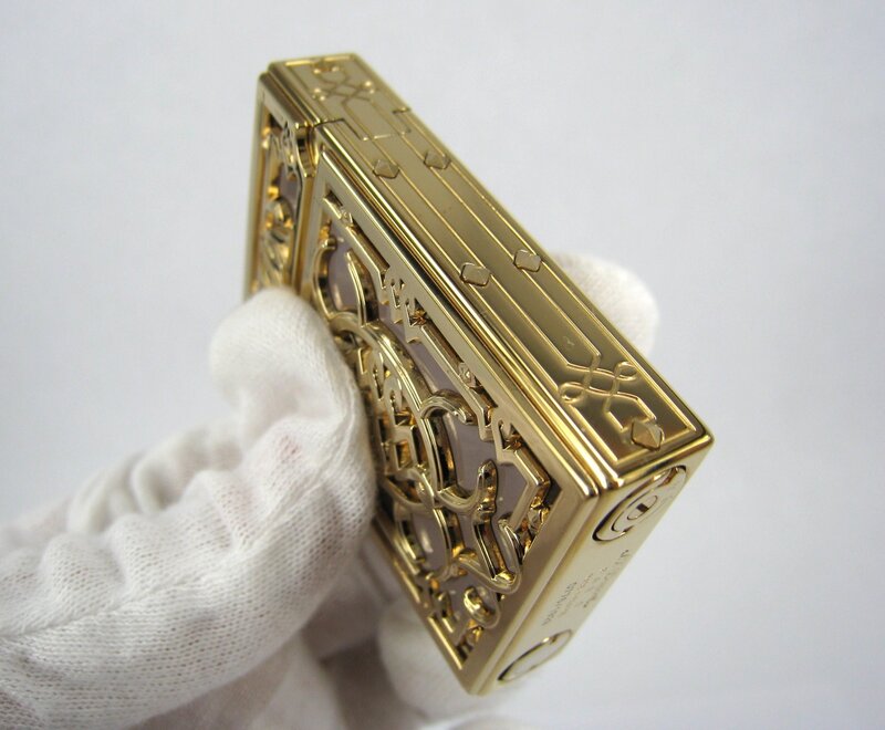 Gold Lighter with Filigree — Neutral, Photograph, Hand, Glove