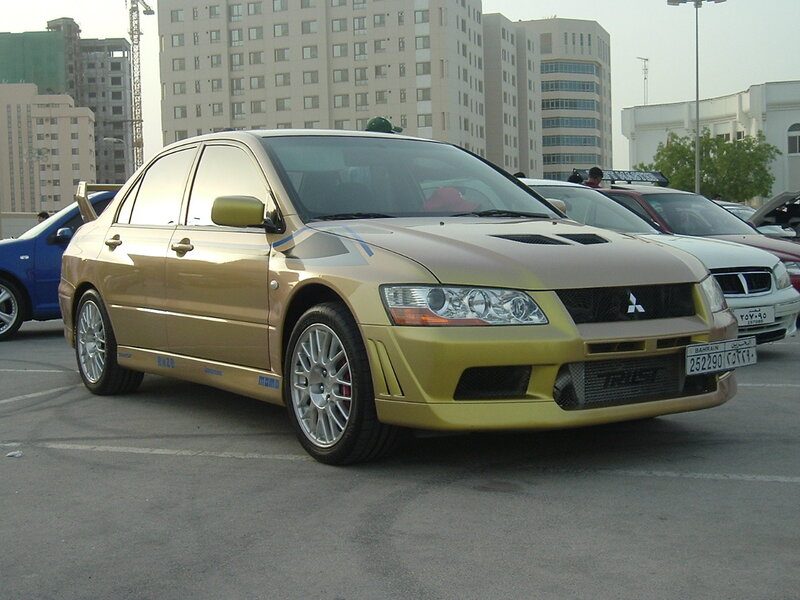 gold Mitsubishi Lancer Evolution