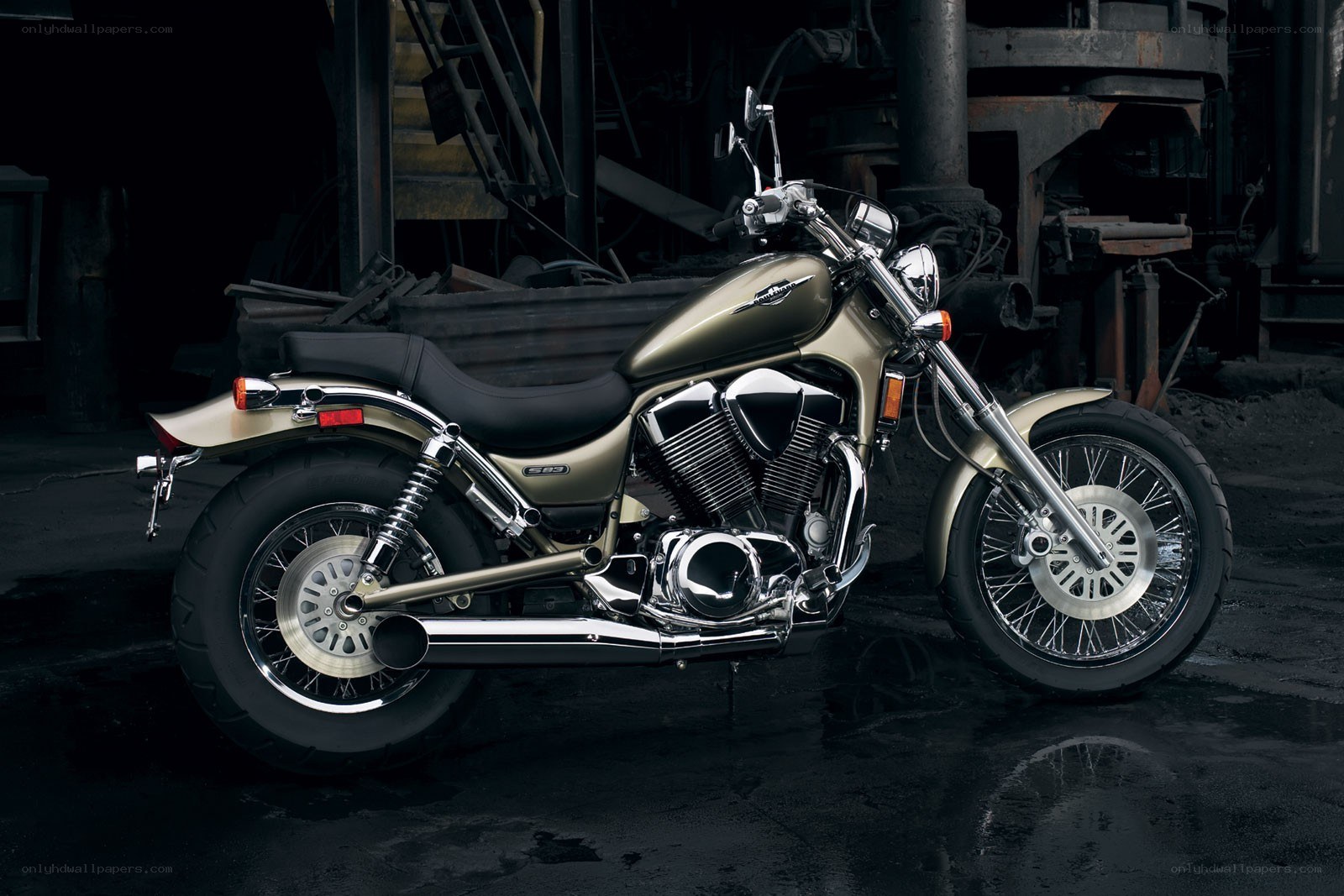 Gold motorcycle in industrial setting