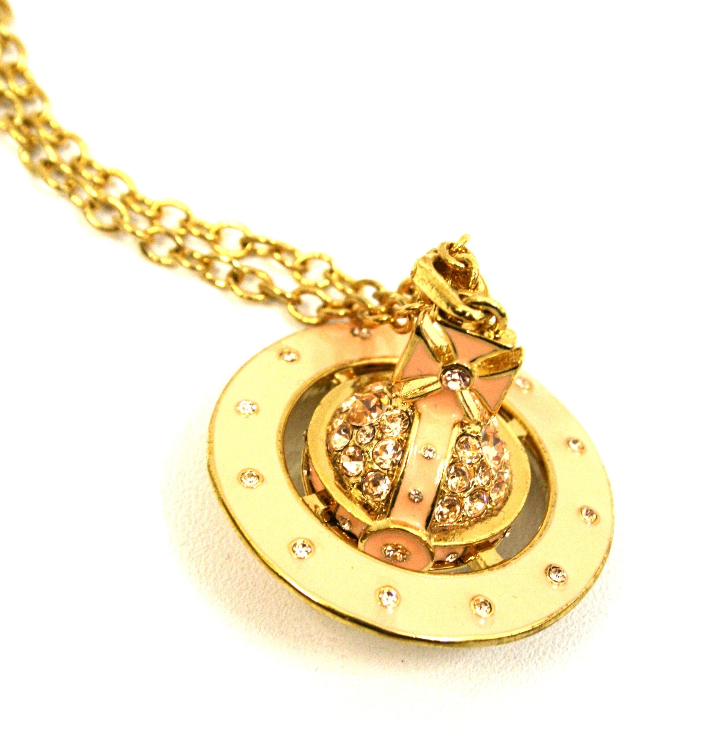 gold necklace with crystal pendant