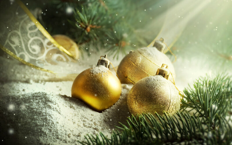 Gold Ornaments in Snow — Festive