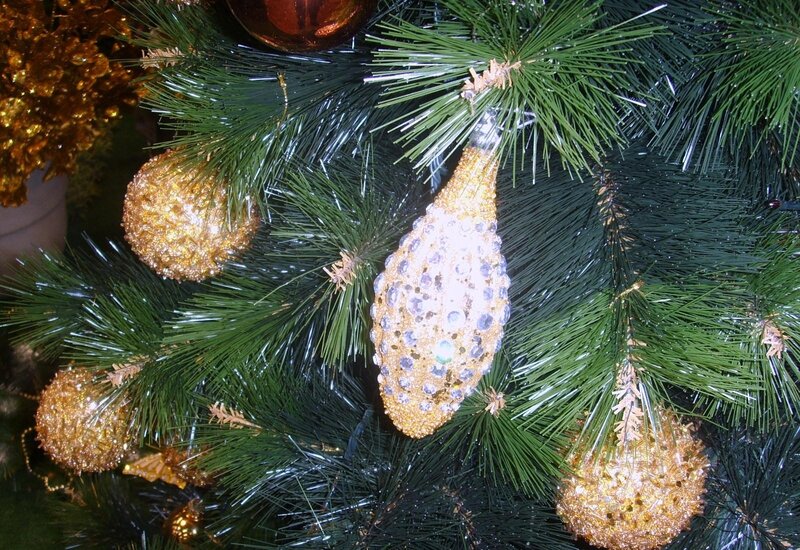 gold ornaments on christmas tree