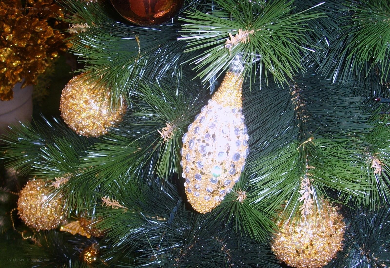 gold ornaments on christmas tree