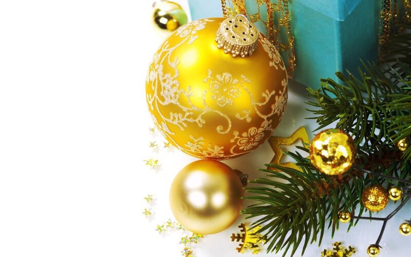 Gold Ornaments on Pine Branch — Festive, Winter