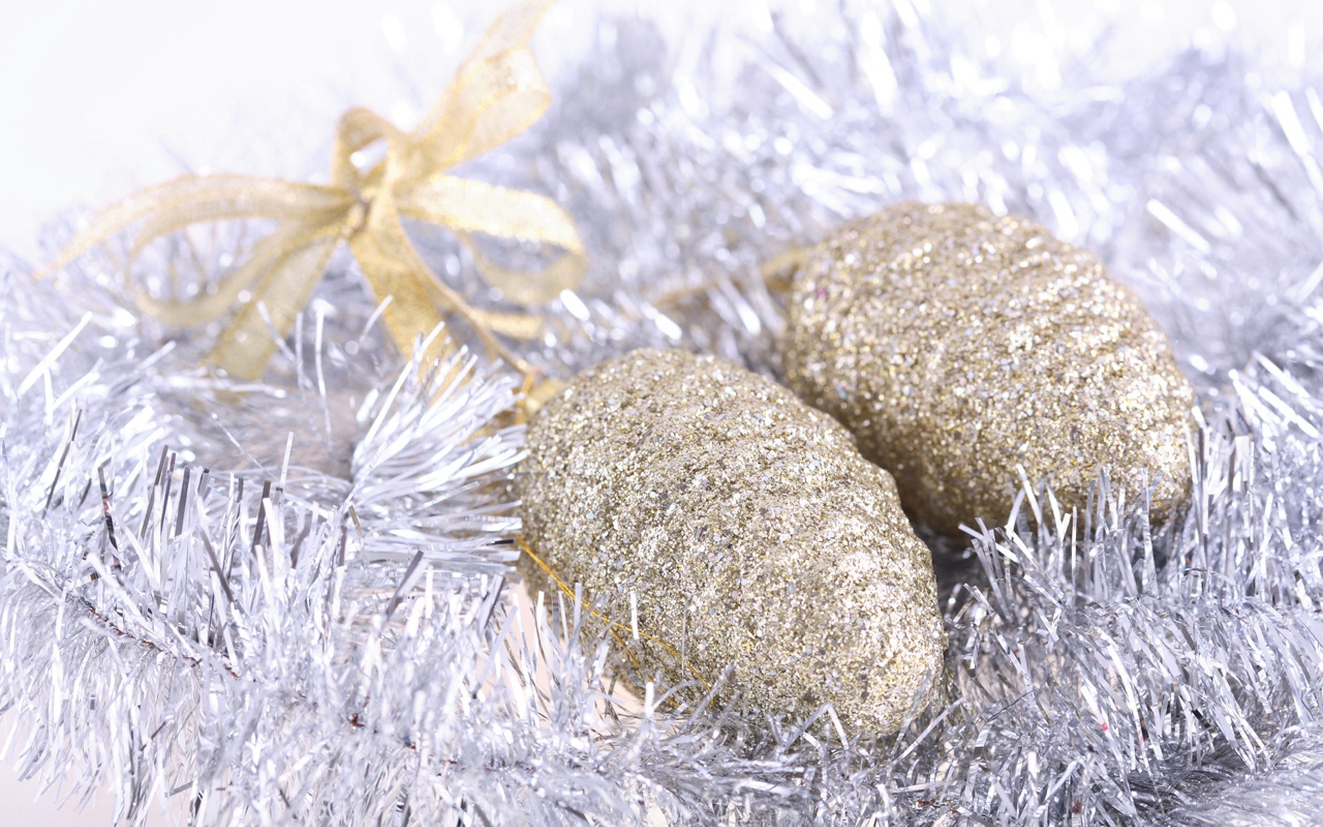 gold ornaments on tinsel