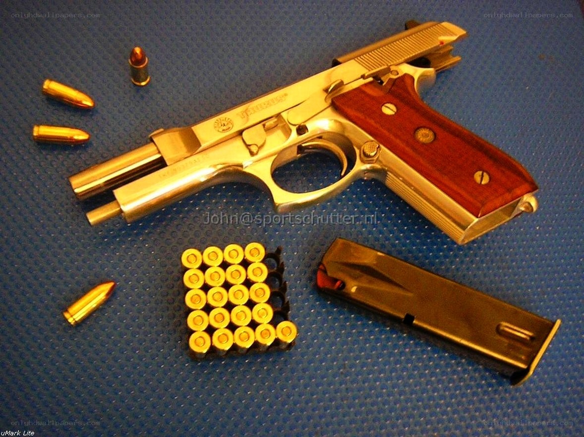 gold pistol with ammunition