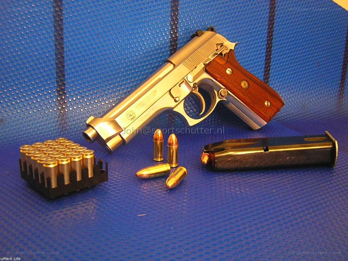 gold pistol with ammunition